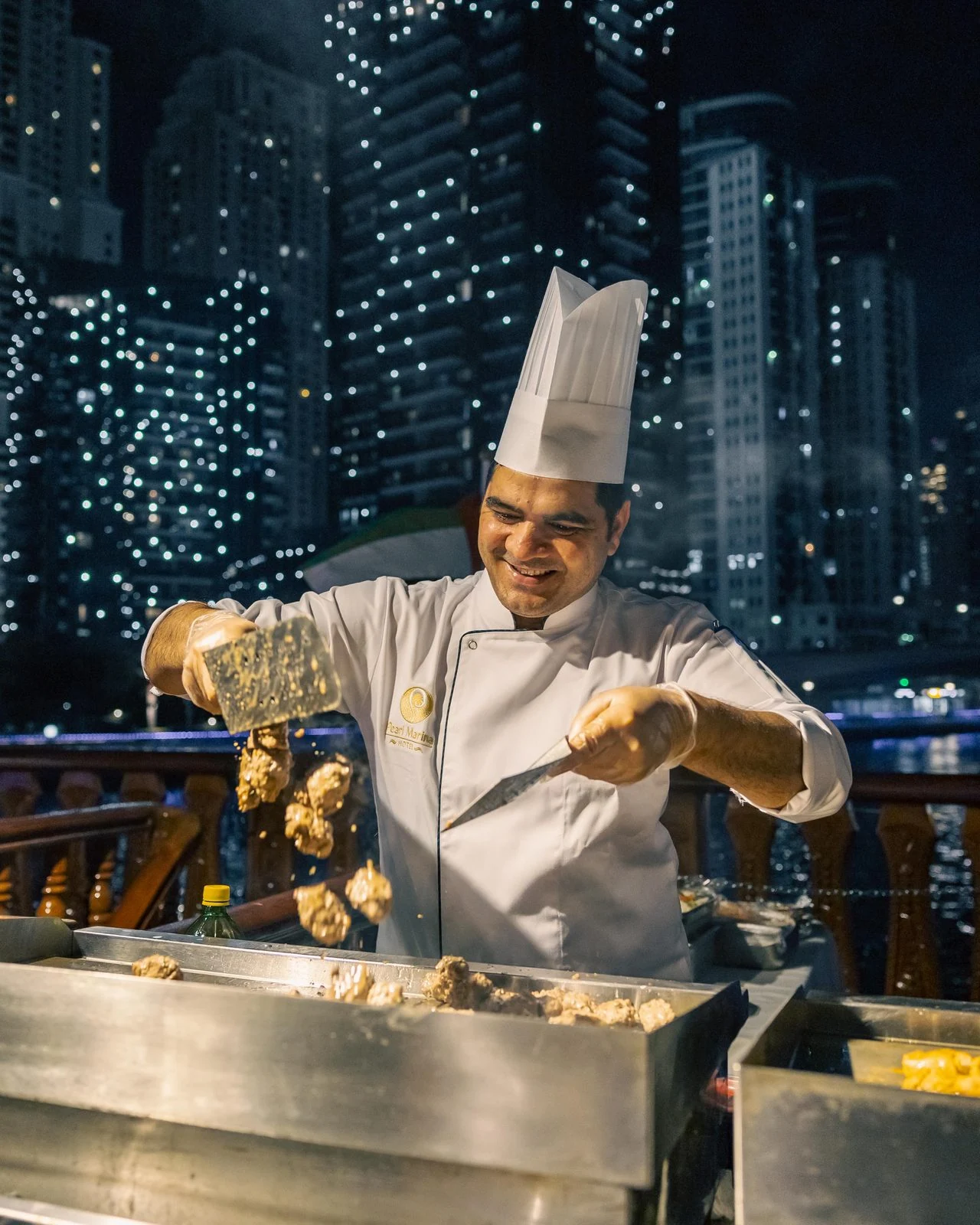 Chef preparing food aboard Alexandra, from dhowcruise.net